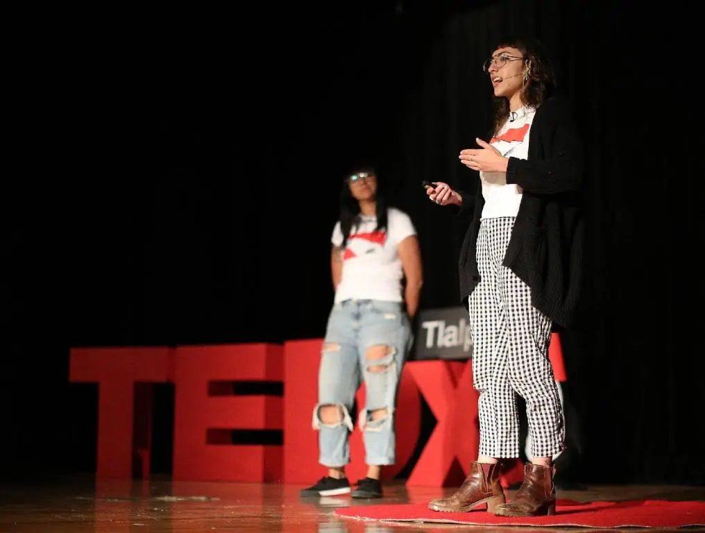 TEDx stage with people on it